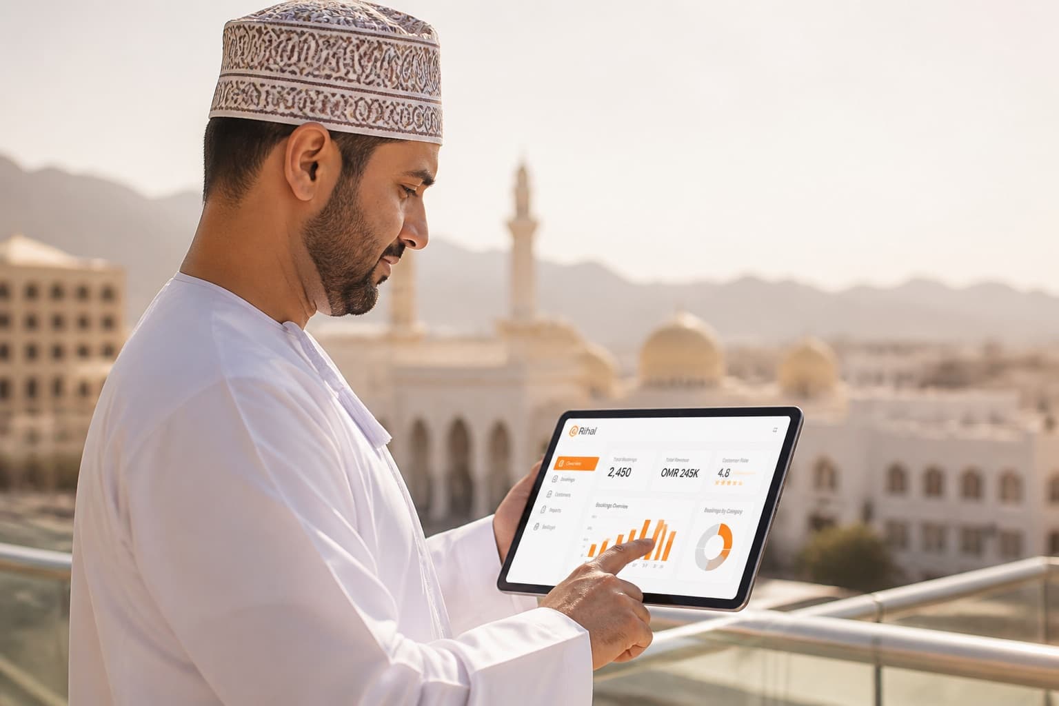 Business owner in Muscat reviewing a mobile app prototype on a tablet